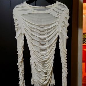 Shredded white mesh long sleeve top.
